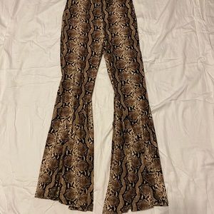 super cute cheetah and rattlesnake bell bottoms